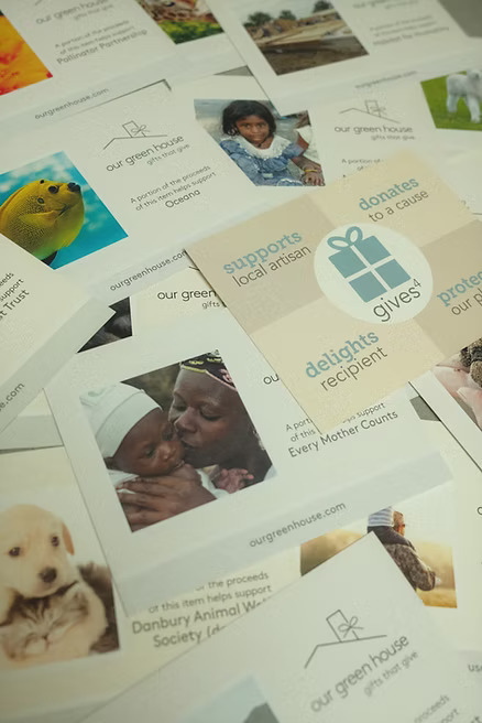 Collection of gift cards supporting artisans and causes.