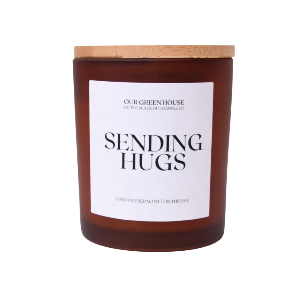Complementary lavender candle from Our Green House, ideal for a self-care gift basket.