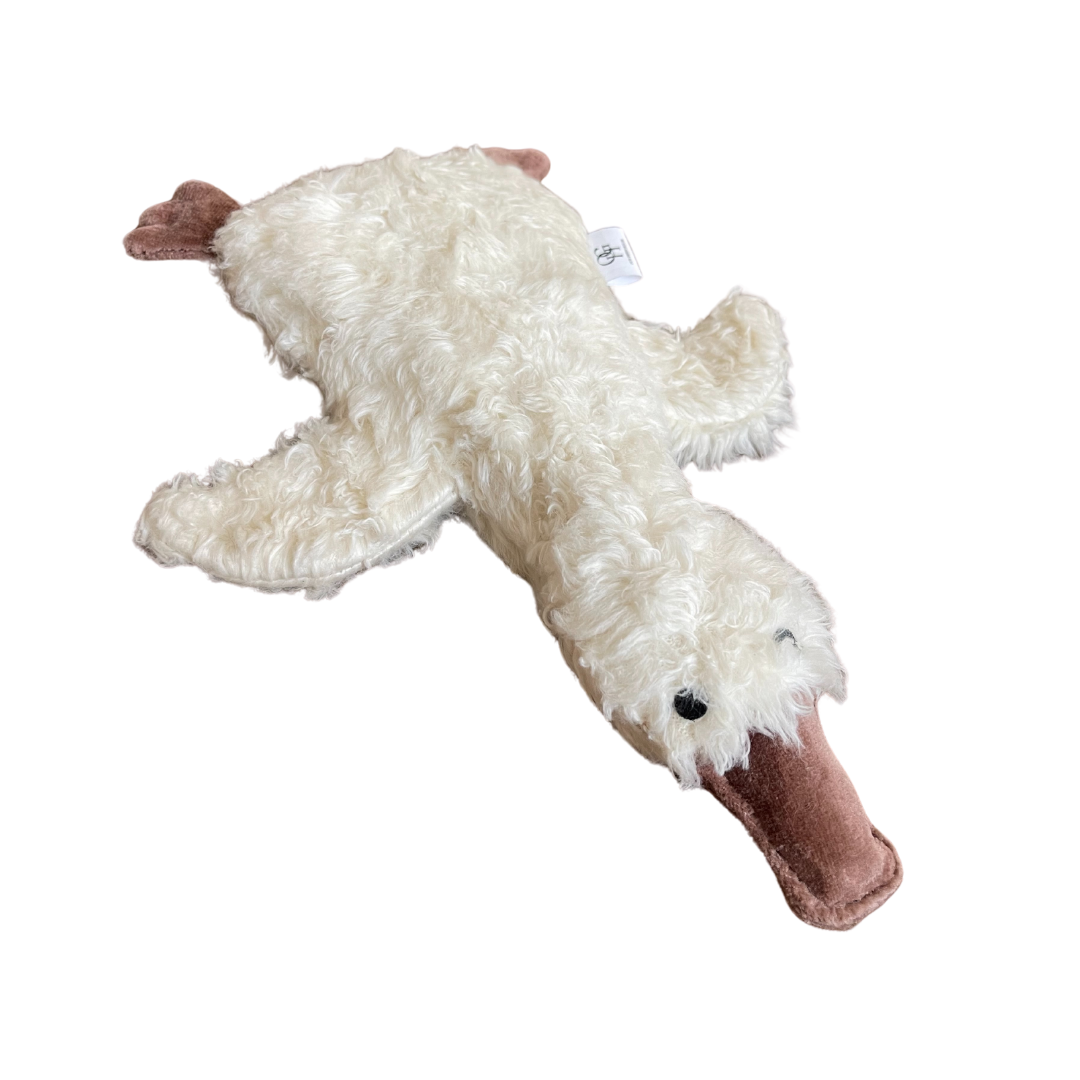 Organic goose plush dog toy made from organic cotton, displayed as part of a non-toxic pet gift.