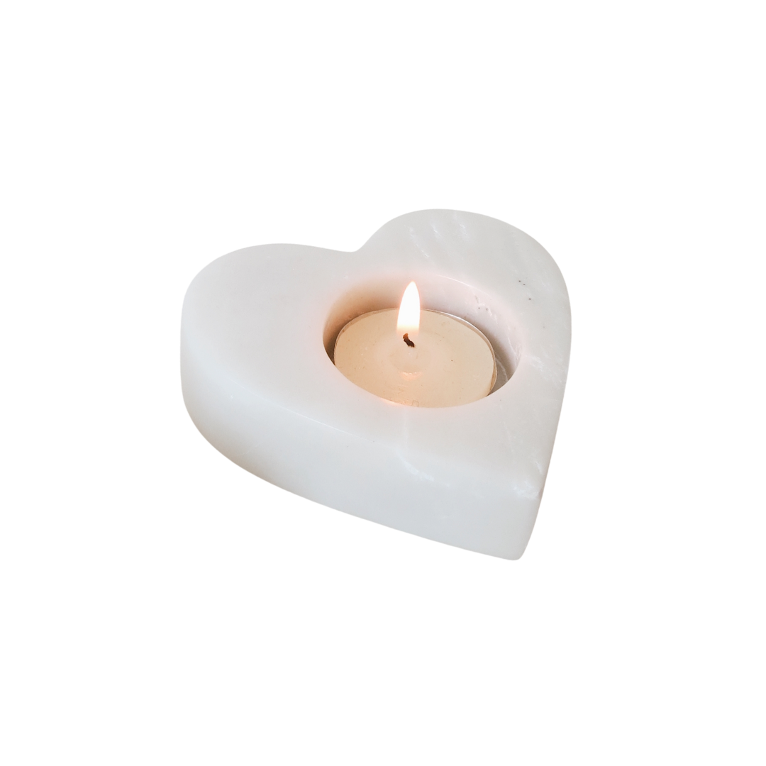 Artisan stone heart-shaped candle holder from Our Green House used as a holiday gift accent.